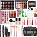 Collection of makeup products including palettes, brushes, and a carrying case on a white background.