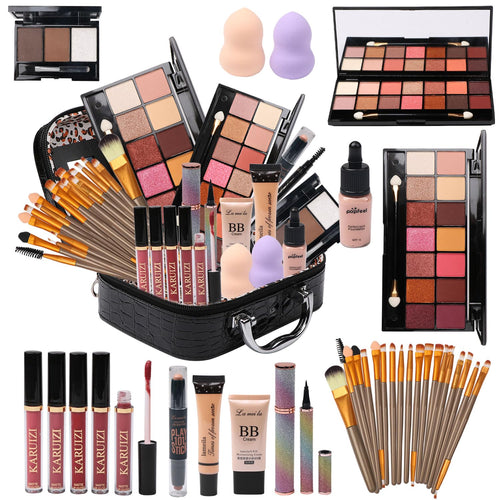 Assorted makeup products including palettes, brushes, and lip products displayed in a black suitcase.