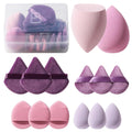 Set of makeup sponges with a clear container on a white background