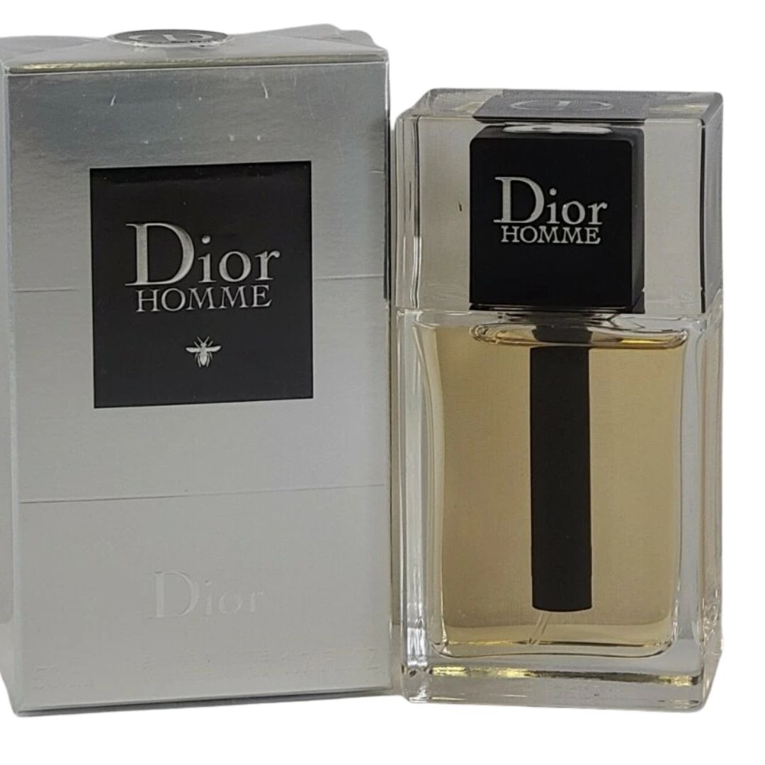 Dior Homme perfume bottle and packaging on a white background