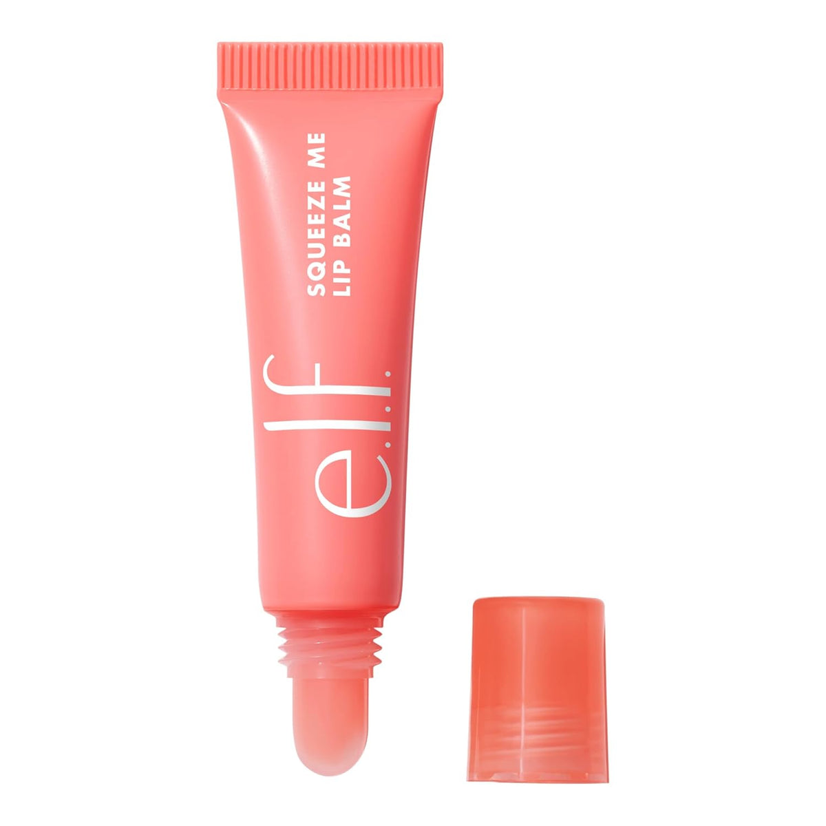 Coral lip balm with cap on a white background