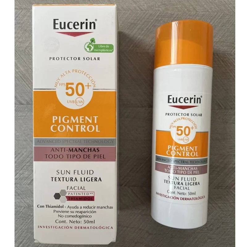 Eucerin Pigment Control Sun Fluid 50+ SPF 50 sunscreen bottle and its retail box, displayed side-by-side on a gray textured background.