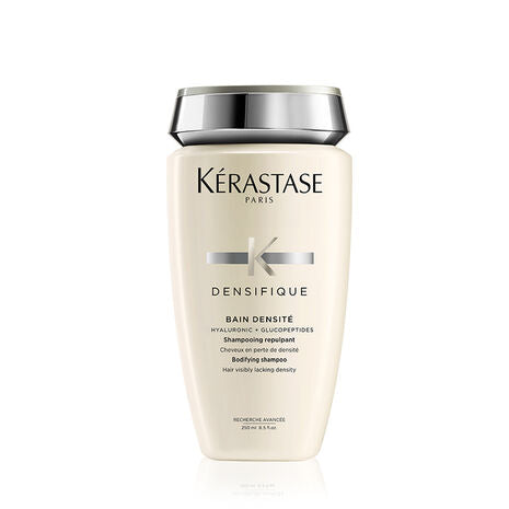 Kérastase shampoo bottle on a white background