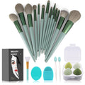 Set of makeup brushes with a carrying case, sponges, and a brush cleaner on a white background.