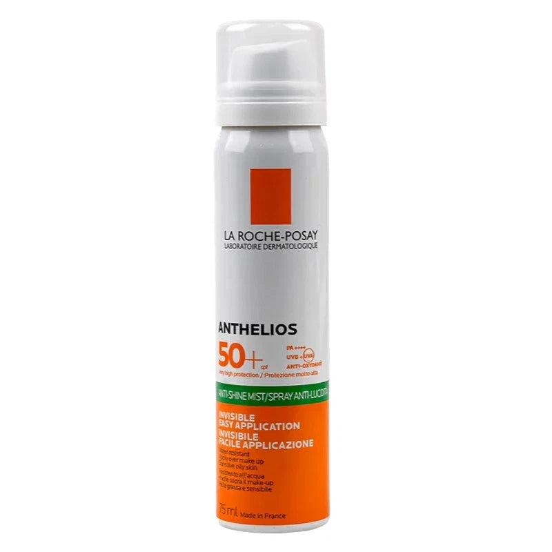 La Roche-Posay Anthelios 50+ Invisible Mist spray can, featuring a white and orange design with a white pump dispenser, set against a plain white background.