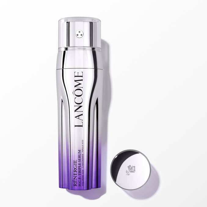 Lancème skincare bottle with purple gradient on a white background