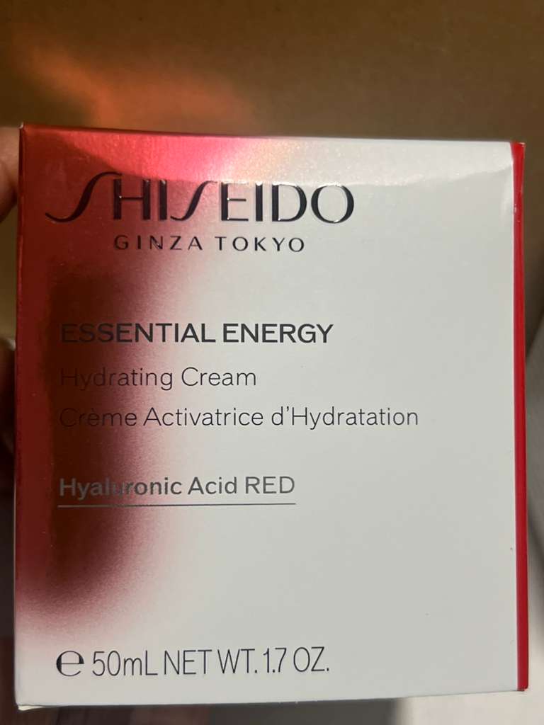 Shiseido Ginja Tokyo Essential Energy Hydrating Cream box, featuring a white and metallic rose gold design with black text.