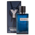 Blue Yves Saint Laurent perfume bottle with packaging on a white background